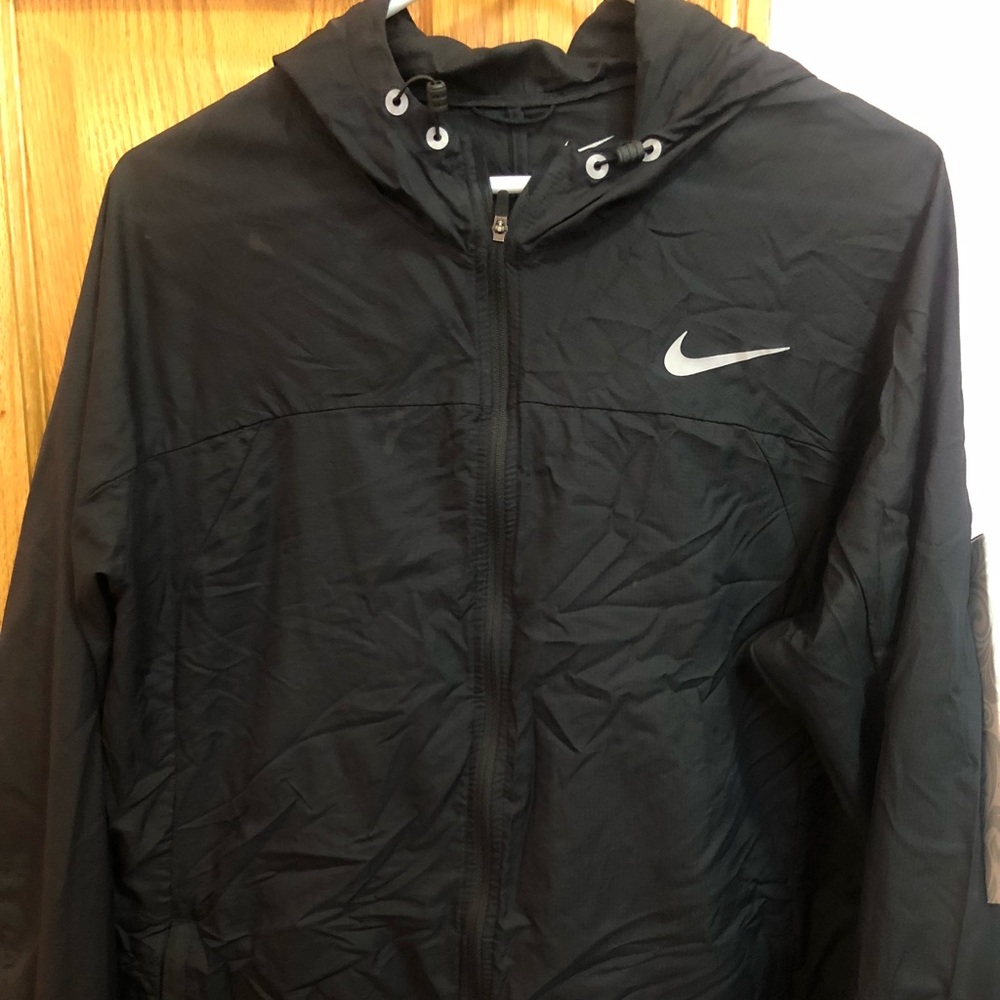 NIKE windbreaker, runs a little small